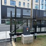 access gate + building